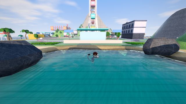 The pool by the amusement park and its ferris wheel